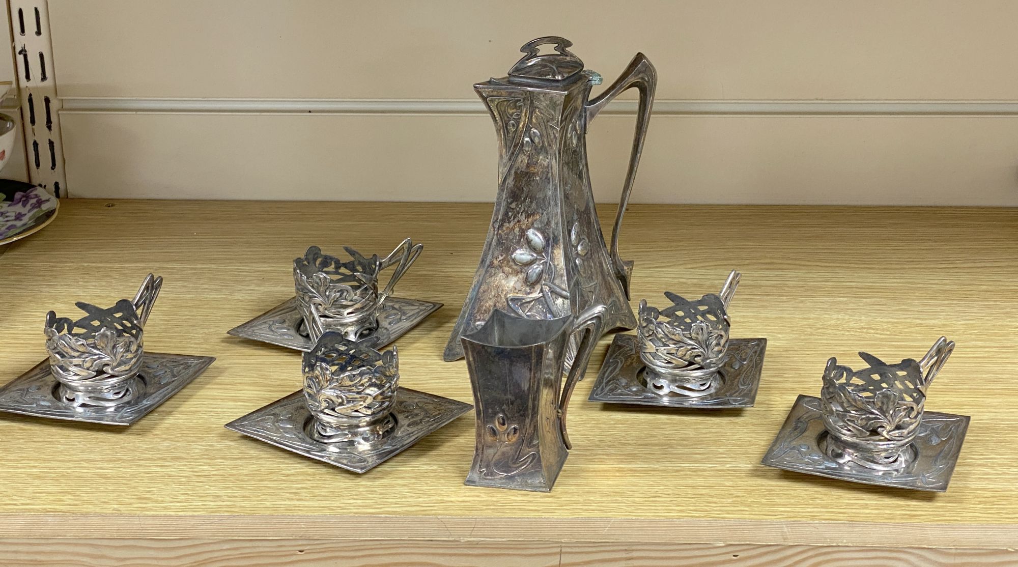 An Art Nouveau pewter coffee set etc.